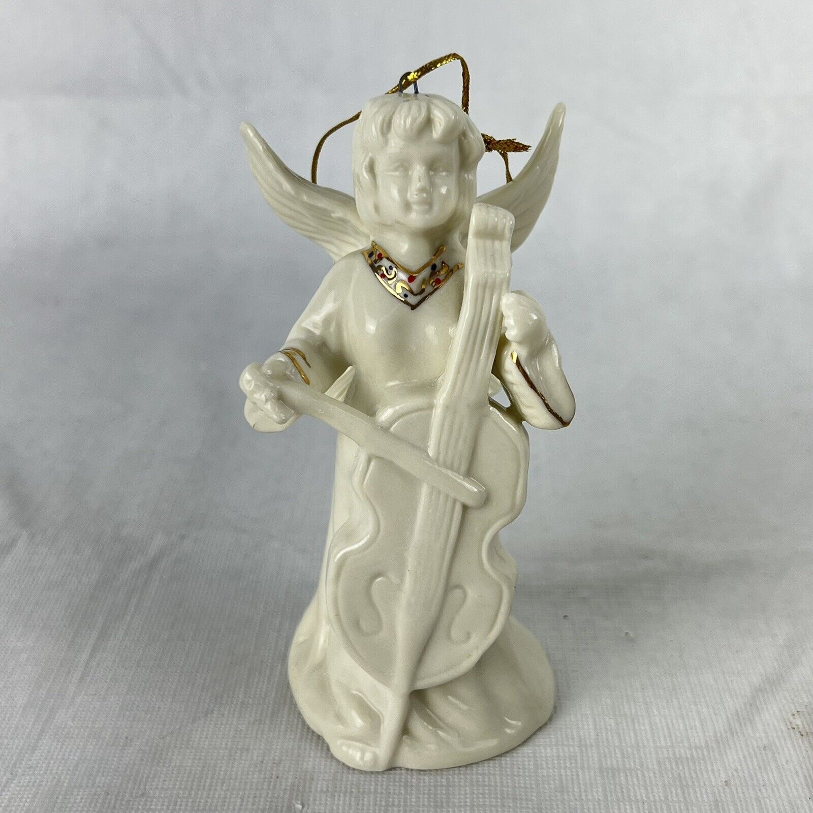 Angel Bell Porcelain Christmas Ornament Playing String ￼ instrument
