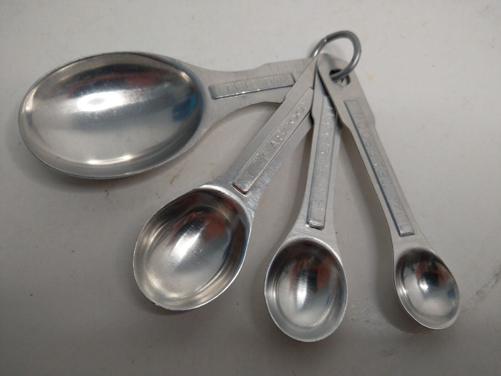 Vintage Aluminum Metal Nesting Oval Measuring Spoons With Ring US Std Set of 4