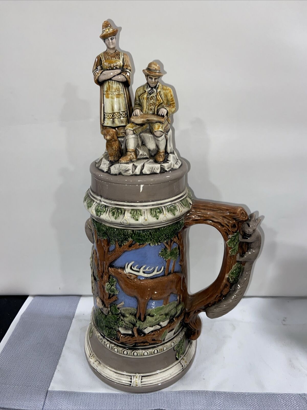 Vintage German  Ceramic Beer Stein With Figures On Lid  15” Tall
