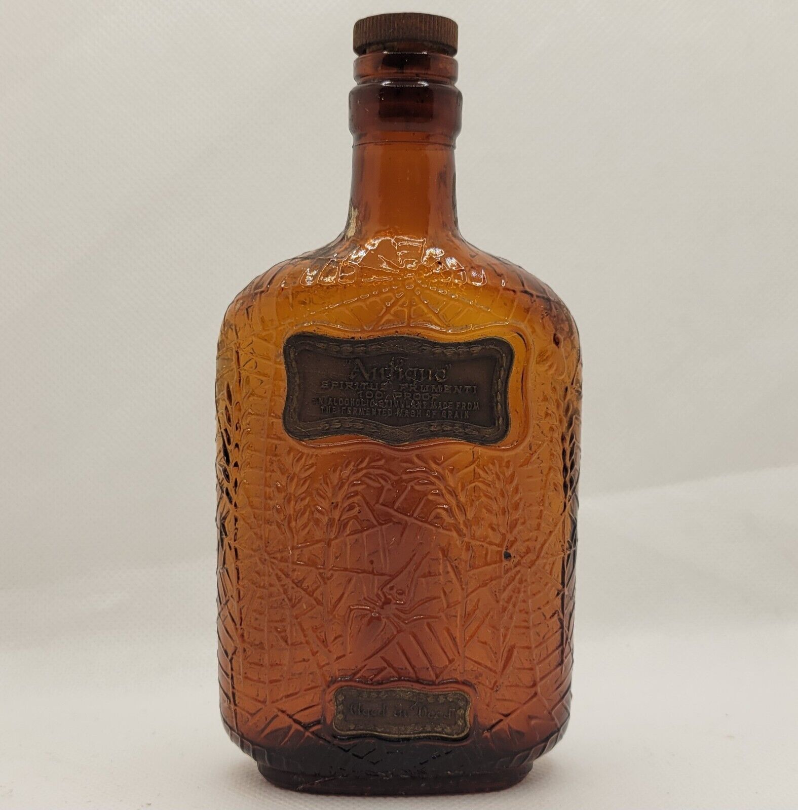 Antique 1900s Spiritus Frumenti Whiskey Bottle Amber Pint Embossed Spider Web