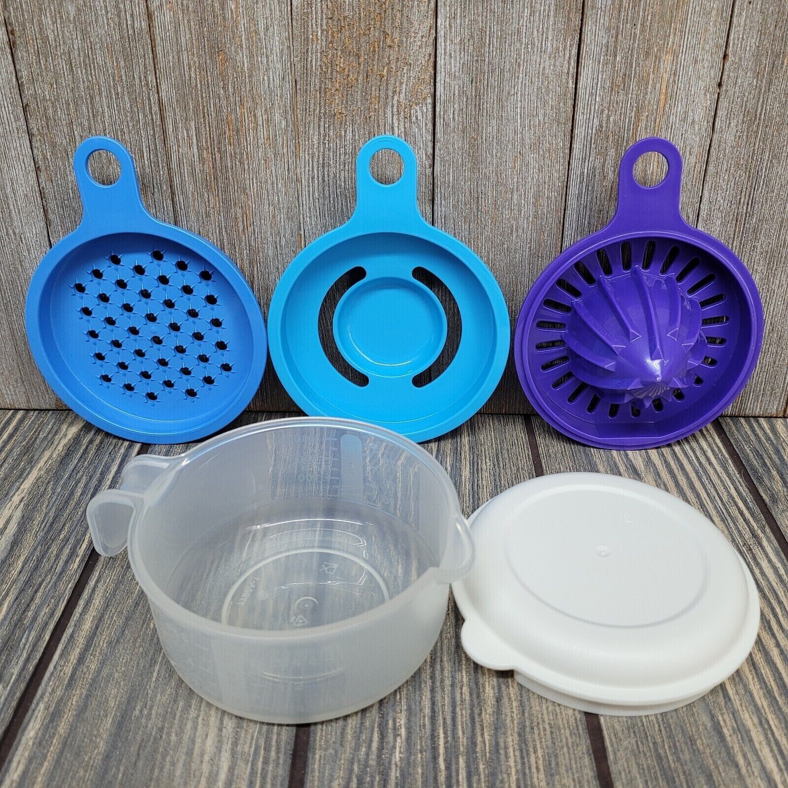 Tupperware All-in-One Juicer/Grater/Egg Separator Measuring Cup Cooks Maid Set