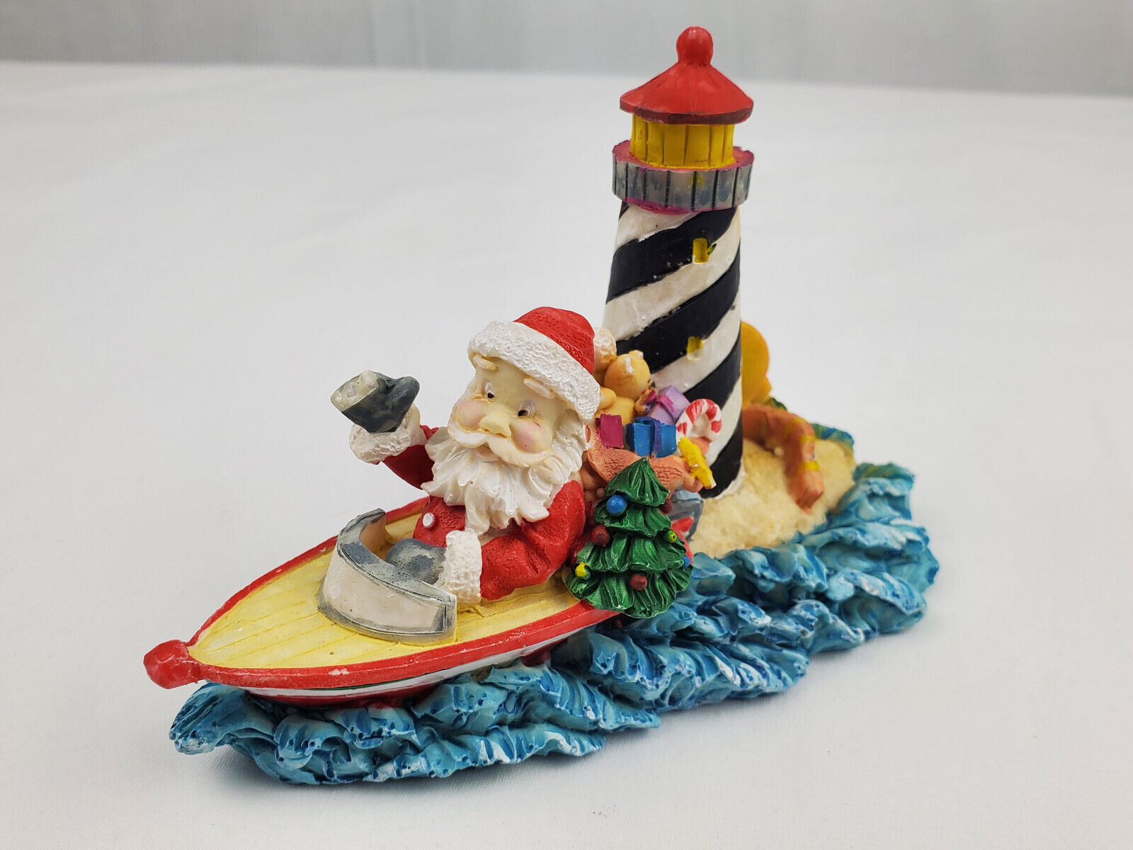 Vintage Seaside Santa By ERCO Tampa FL Motorboat Santa Lighthouse Figurine