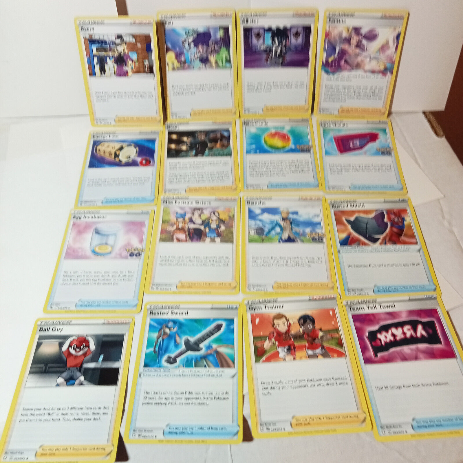 lot of 16 uncommon Pokemon Trainers , as pictured, nm all never been played...