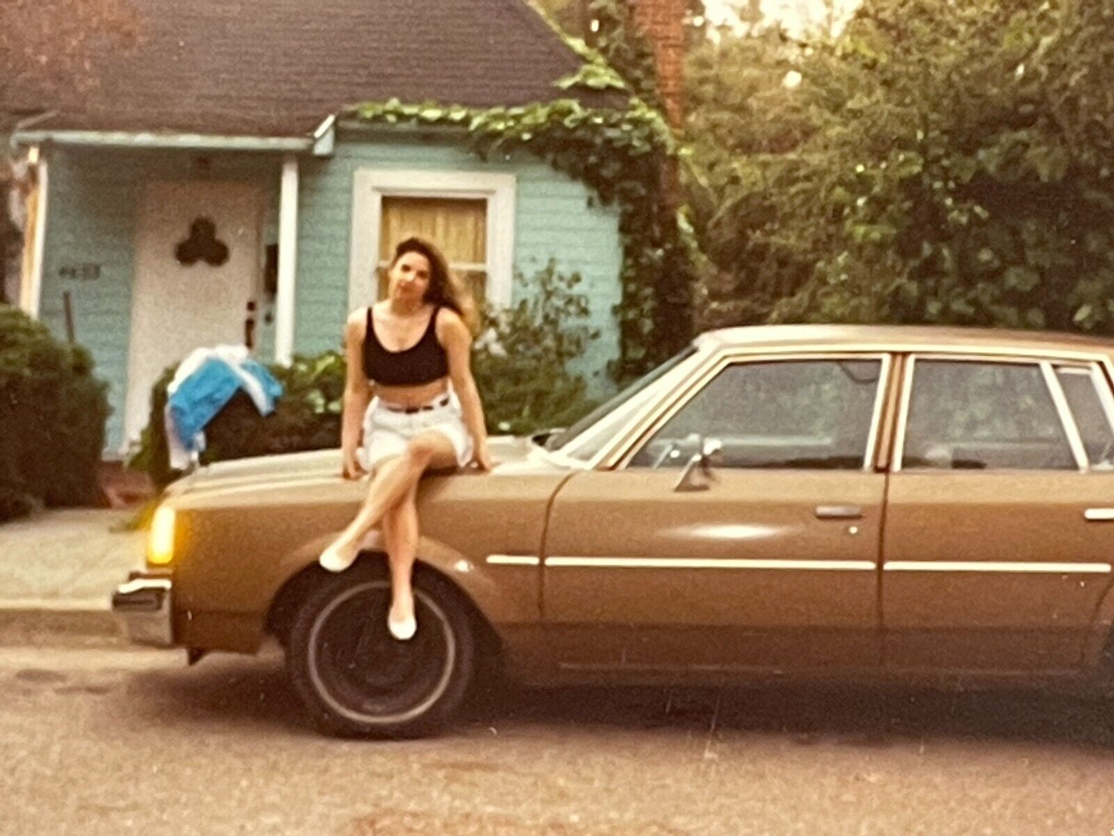 Z1 Photograph Woman Poses On Old Car 1980's