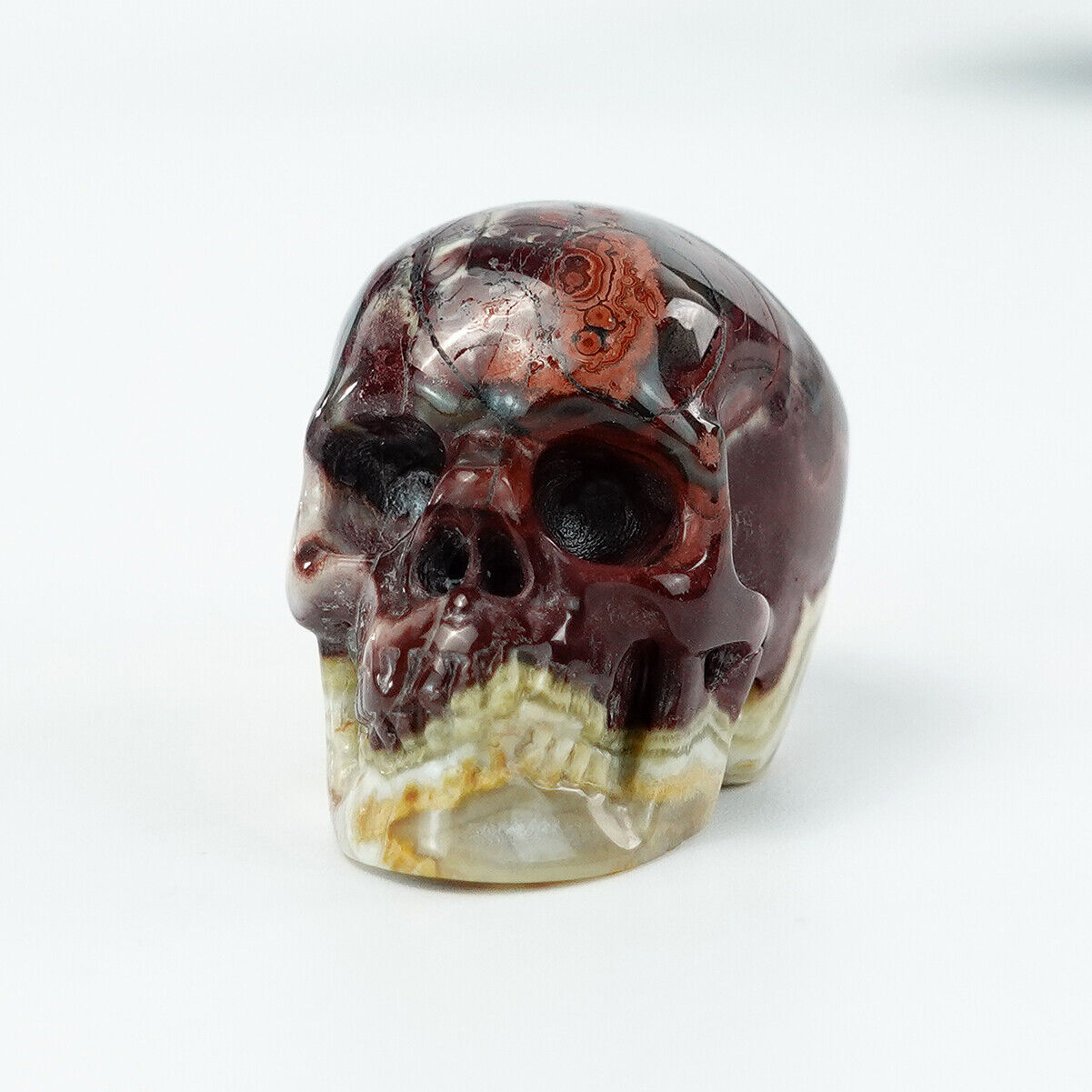 Red Crazy Lace Agate Quartz Stone Realistic Skull Carved Natural Crystal Statue