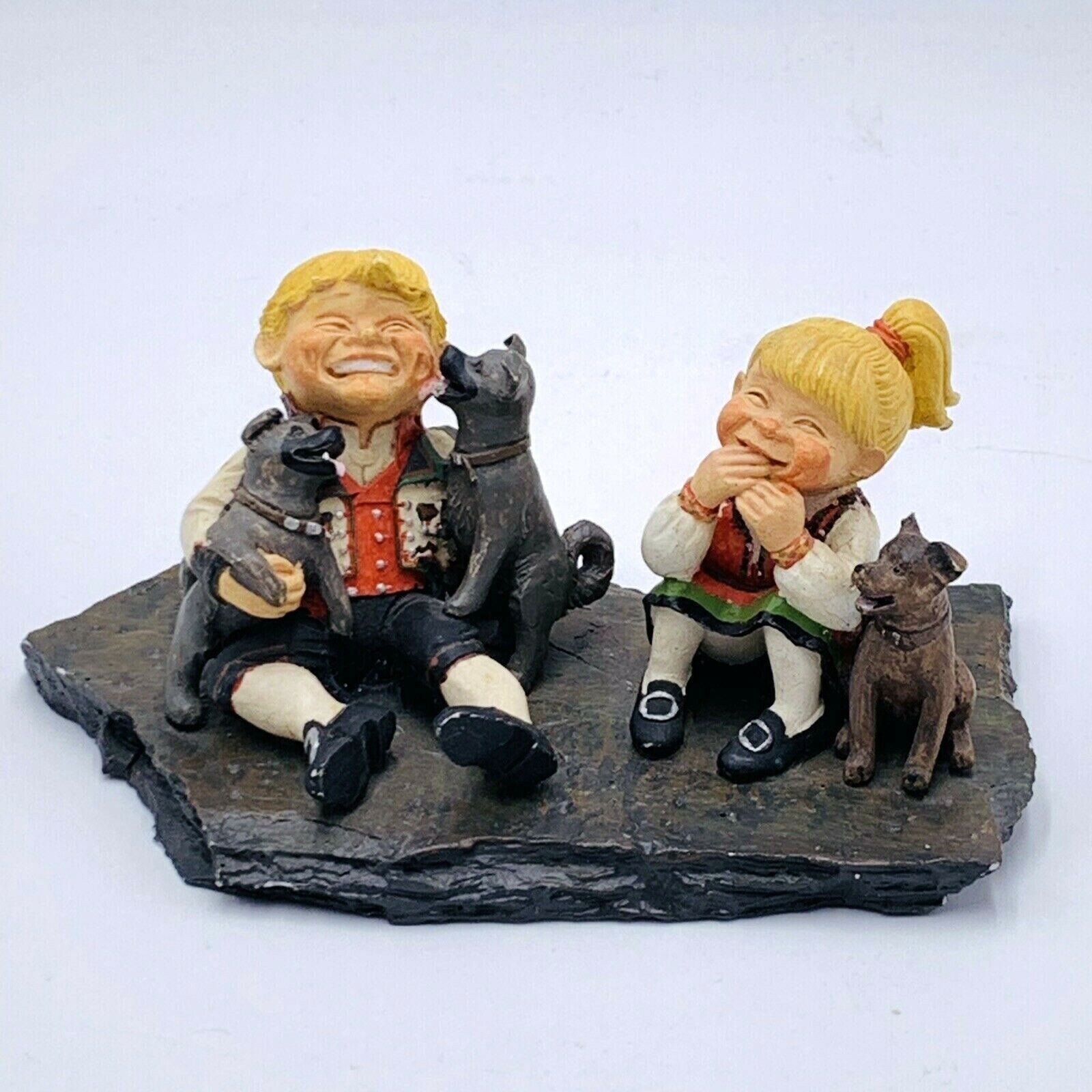 Candy Designs Norway Vintage Laughing Boy and Girl with Dogs Figurine