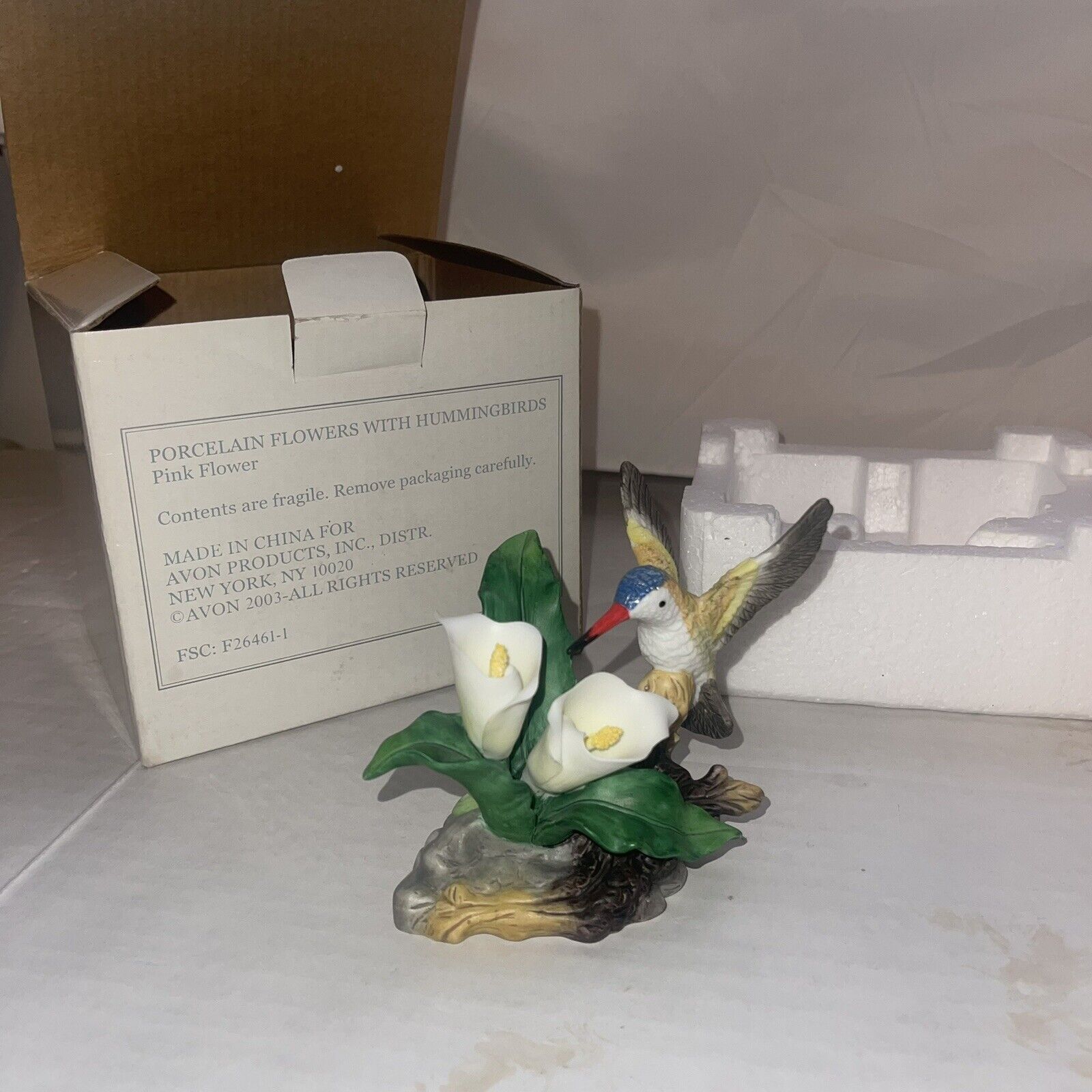 Vintage Avon Porcelain Hummingbird Figurine on Limb wih White Flowers 2003 