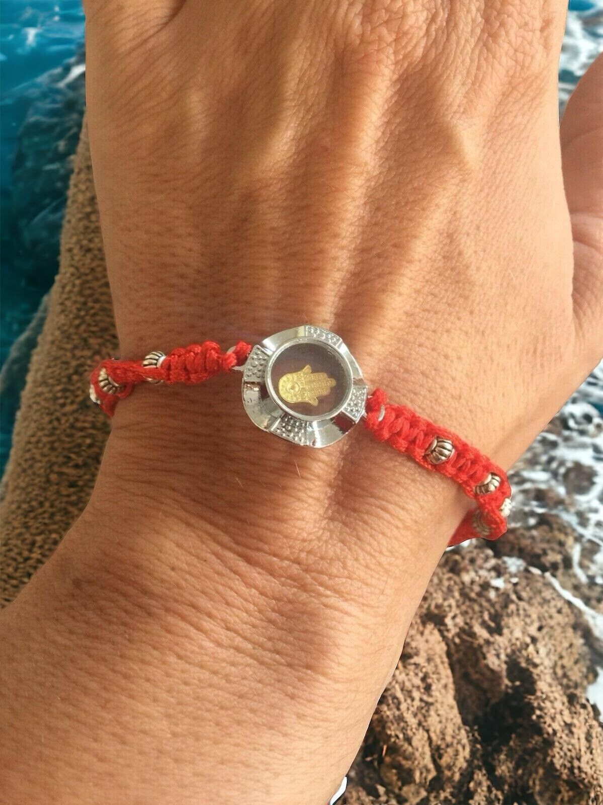 Red string spinning lucky hand Hamsa Kabbalah protection bracelet from Jerusalem