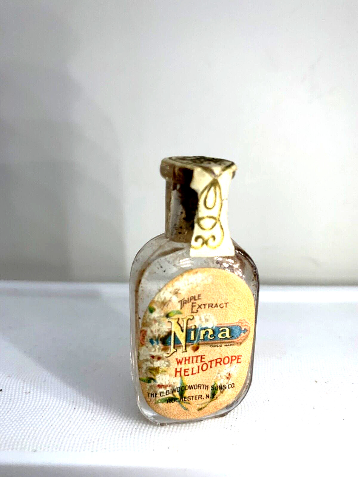 Petite  Antique mini perfume bottle. White Heliotrope, CB Woodworth Sons. 1900
