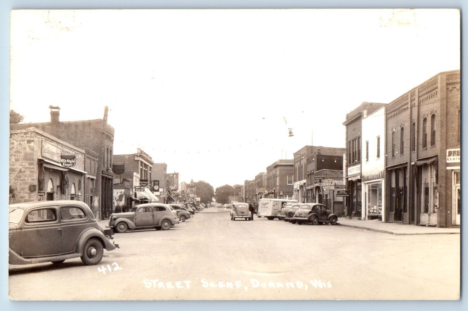 Durand Wisconsin WI Postcard RPPC Photo Street Scene Cars Cafe 1942 Vintage