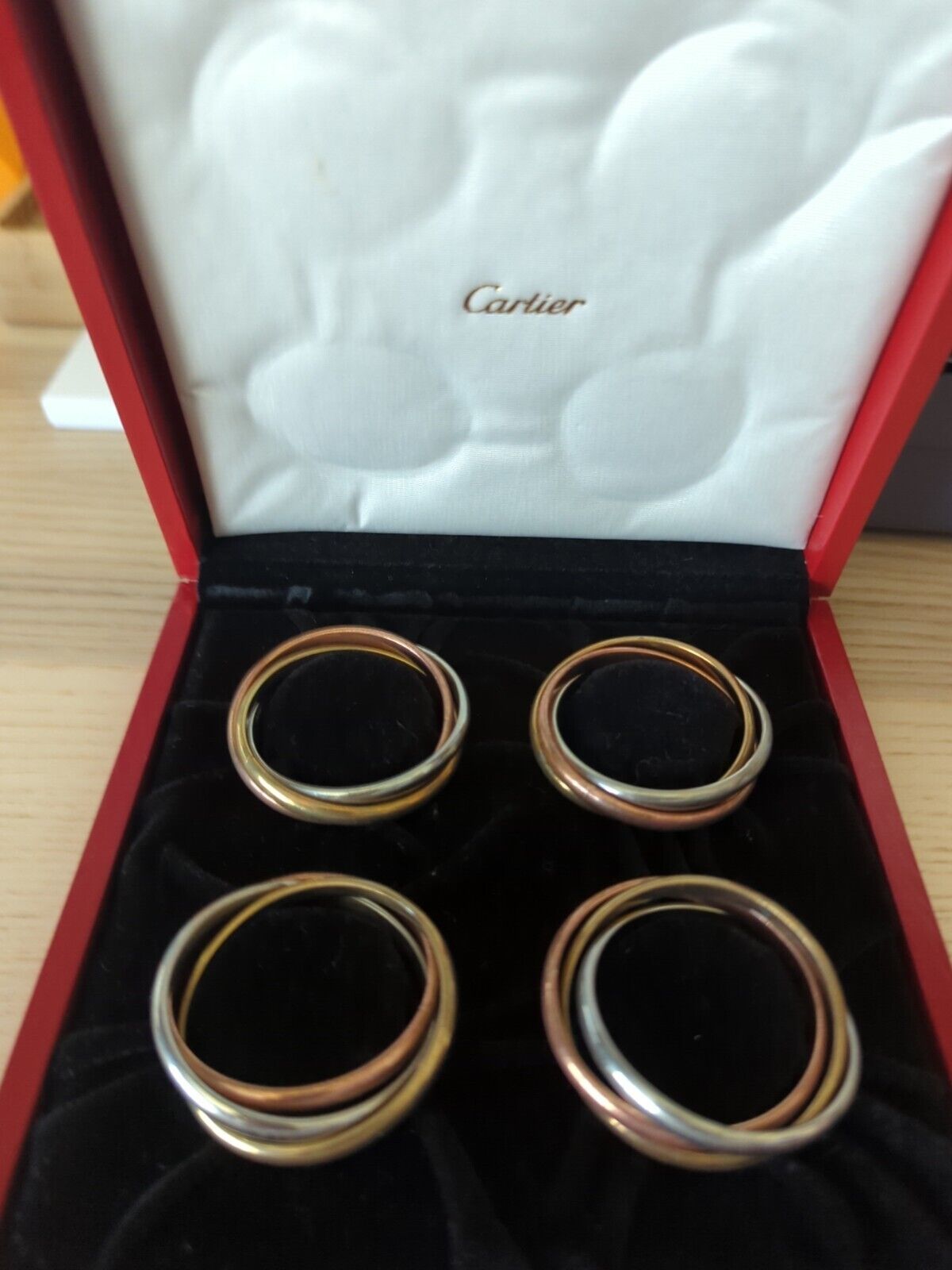 Cartier Silver, Copper and Brass Napkin Rings Set Of Four In Original Case