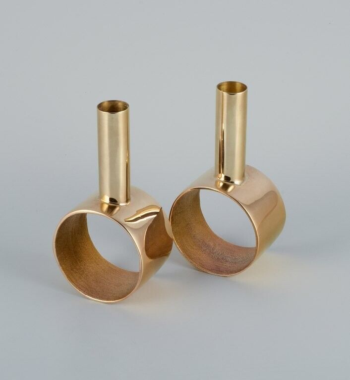 Swedish design. A pair of  brass candlesticks. Late 20th C.