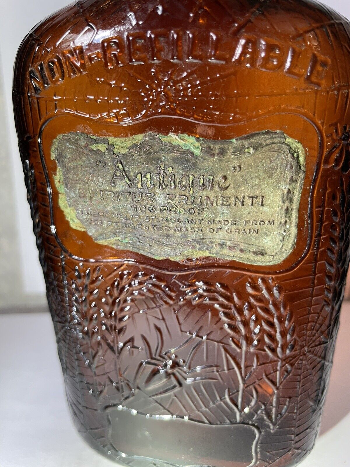 Antique Spiritus Frumenti 100 Proof Whiskey Amber Pint Flask Spider Web Bottle