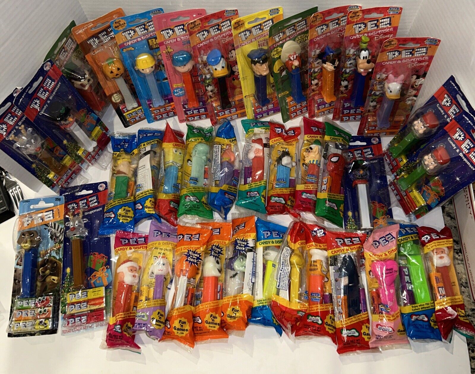 Vintage Pez Dispensers Large Lot of 48 NEW on cards and in bags