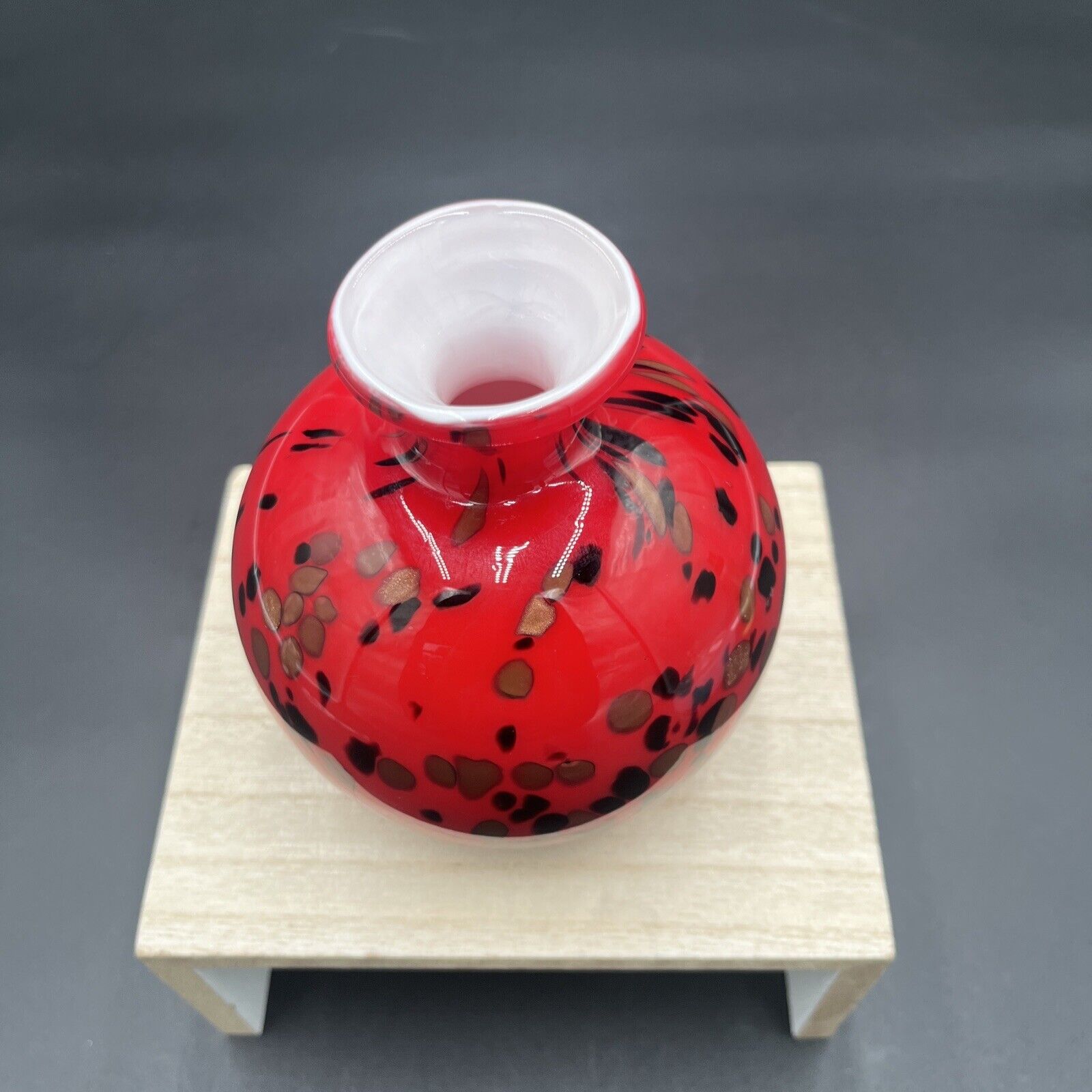 Vintage Red Cased White 4” Round Art Glass Bud Vase Glittery Cooper Specks