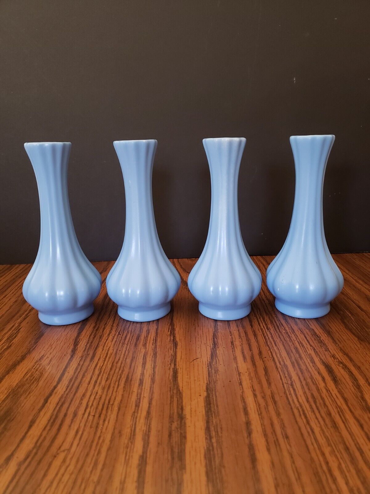 4 Blue.Bud Vases Very nice no chips.