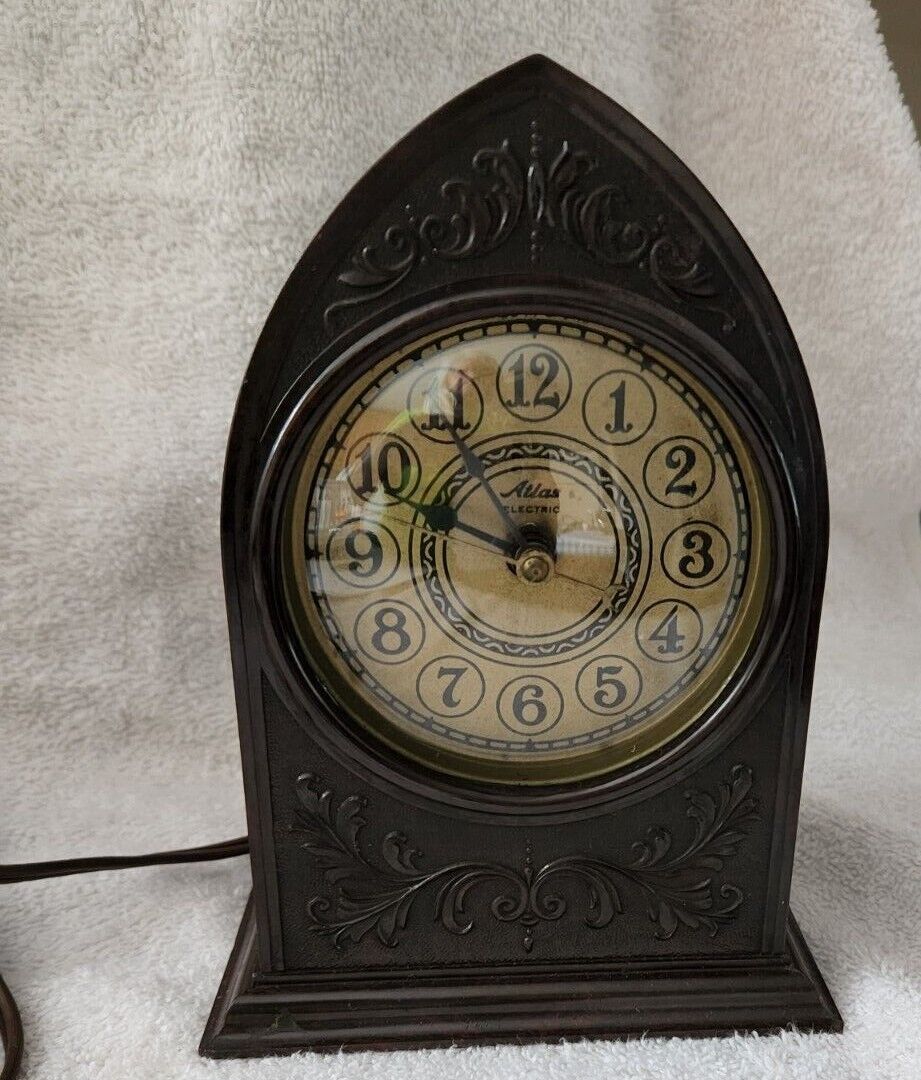  Atlas electric Manual-start clock. Cathedral style bakelite case.