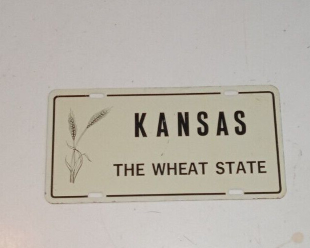 ANTIQUE OLD VINTAGE KANSAS LICENSE PLATE BOOSTER THE WHEAT STATE GRAPHICS