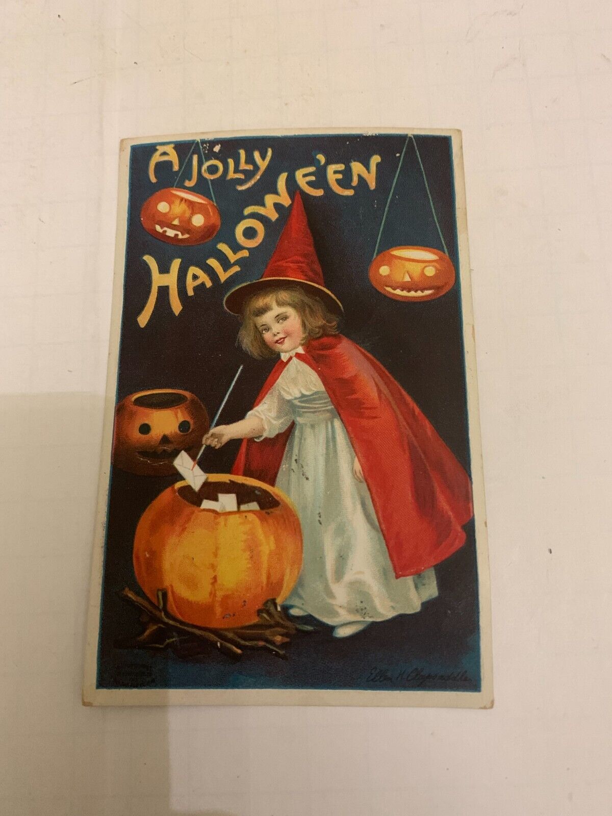 1911 A Jolly Halloween Embossed Ellen Clapsaddle Postcard Witch Jack-O-Lantern