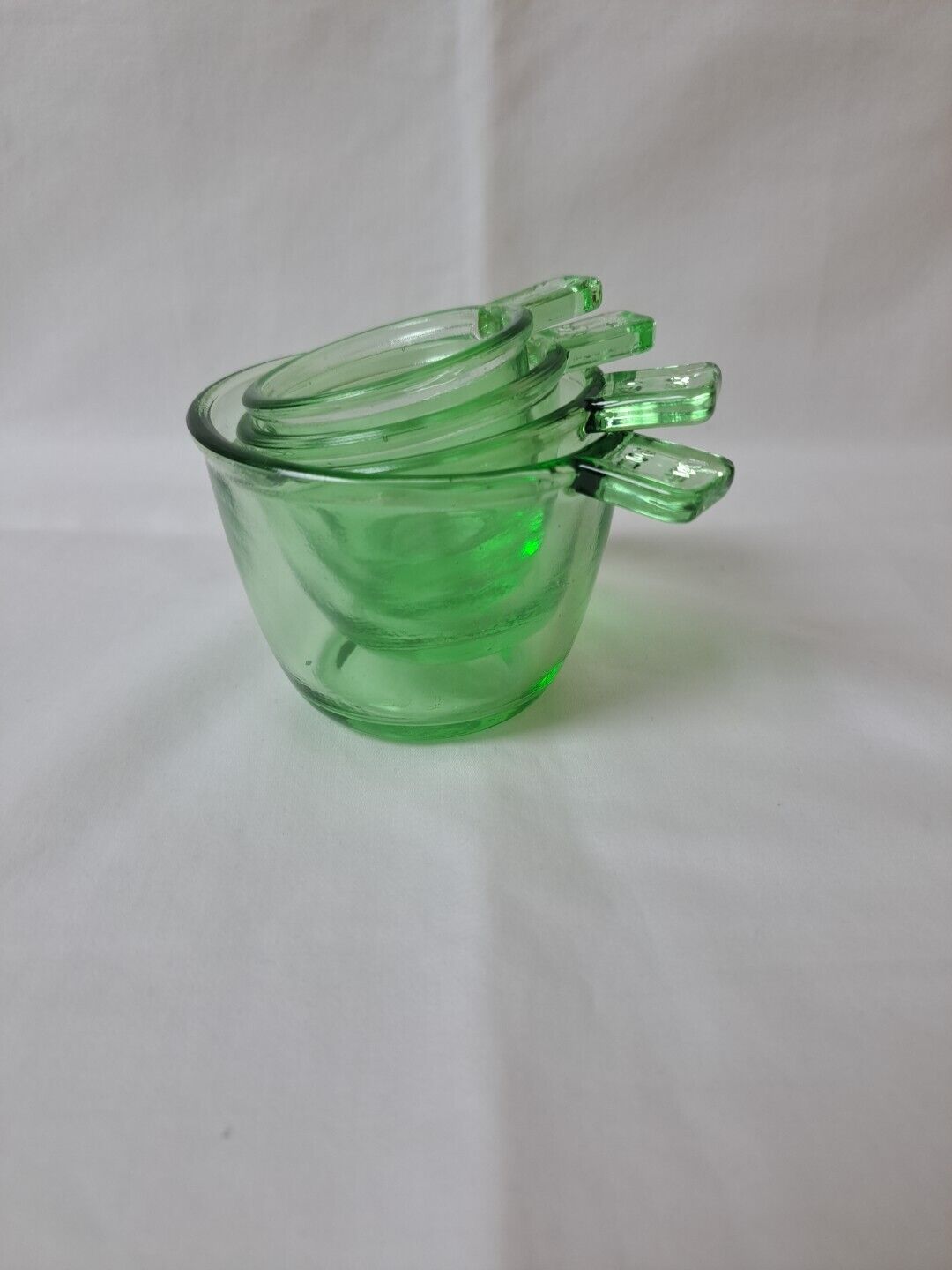 GREEN DEPRESSION STYLE GLASS 4 PC NESTING MEASURING CUP SET 