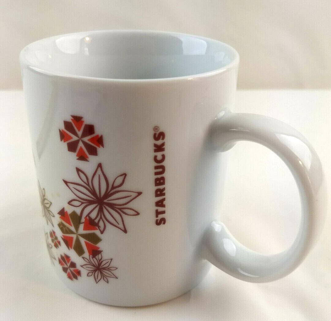 STARBUCKS Christmas Coffee Cup Mug White Red Snowflake Poinsettia Flowers 