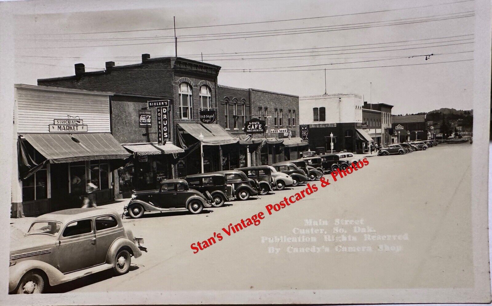 RPPC Coca~Cola South Dakota Main Street Canedy\'s Camera Shop Vintage Card