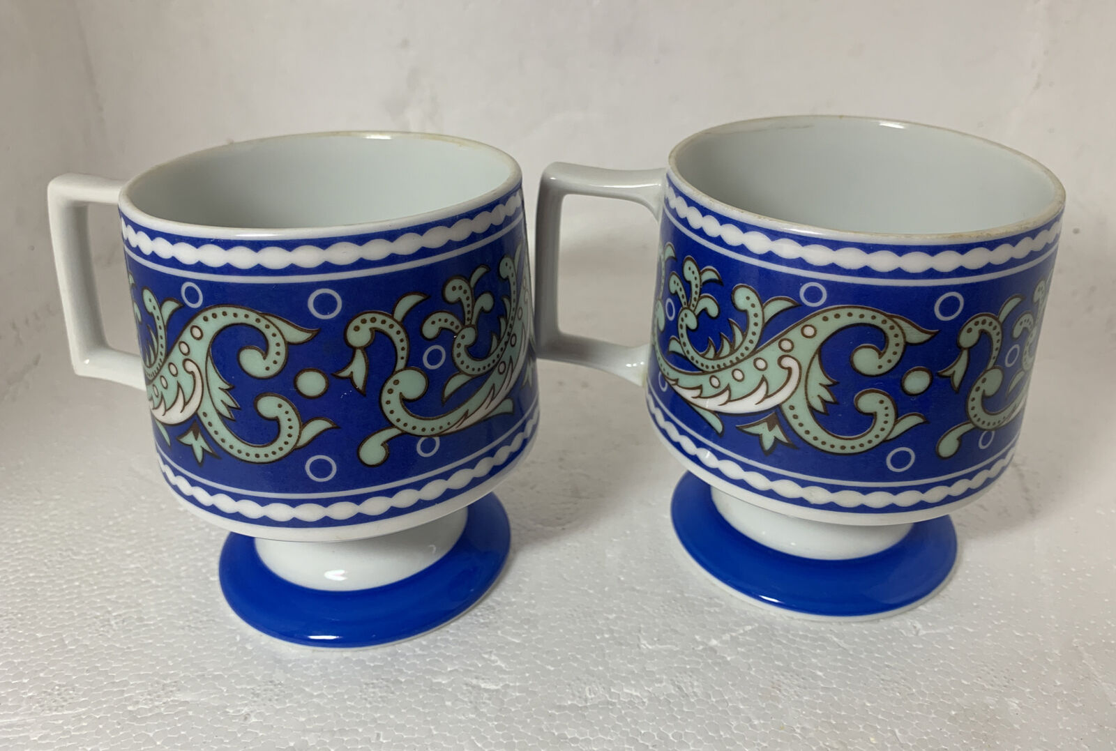 2 Vtg 60’s Mid Century Coffee Mugs Footed Florencia Paisley Stacking Blue Green