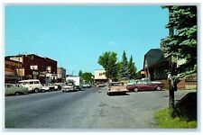 c1960's Street Scene Cars And Shops In Woodruff Wisconsin WI Unposted Postcard picture