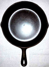cast iron cookware..$65 Number 7 Skillet, Pan sits flat with no spin. picture