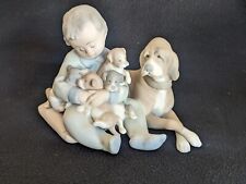 Lladro “New Playmates” # 5456 Boy with Puppies Porcelain Figurine Matte finish picture