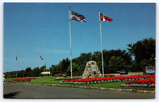 Postcard International Peace Garden Park Entrance Cairn Flags Flowers Unposted picture