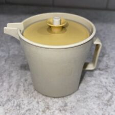 Vintage Tupperware 1414-7 Almond Creamer Pitcher with Yellow Push Button Lid picture