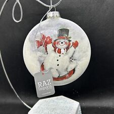 RAZ IMPORTS 5” Snow Tubing Snowman Disc Ornament picture