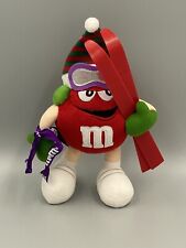 M&M Candy 11” Red Christmas Candy Plush W/ Skis In Striped Hat Stuffed M & M picture
