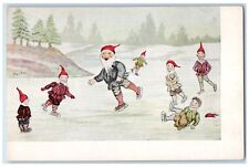 c1905 Christmas Elves Ice Skating Winter Snow Pine Tree Antique Postcard picture