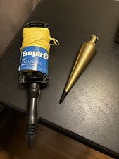 Durable Brass Plumb Bob w/ 250’ of gold line reel - out of box, but never used picture