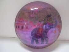 People Riding Elephant in India Glass Paperweight picture