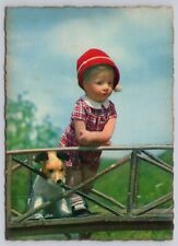 Germany, Kathe Kruse, Doll & Dog Looking Over Bridge, Vintage Postcard picture