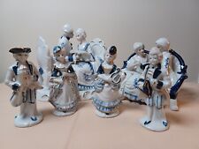 Ceramic sculptures/figurines - Colonial men/women/couples in white/blue/gold picture