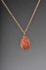 Salmon Spiral Egg Pendant Necklace with crystals by Keren Kopal picture