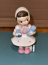 Vintage Ucagco Ceramic Figurine Chore Girl ￼with Packages picture