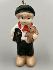 Vintage 3” Ornament Christmas Around The World Christmas Little Boy Holding Dog picture