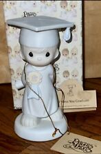 BUY 2 GET 1 FREE PRECIOUS MOMENTS-“GOD BLESS YOU GRADUATE” 106194 - BOY FIGURINE picture