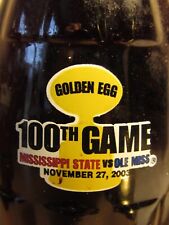GOLDEN EGG 100th GAME MISSISSIPPI STATE / OLE MISS COCA COLA BOTTLE w golden cap picture