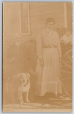Family Photo and Dog Outside their Home c1900's RPPC Real Photo Postcard VTG picture