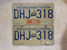 PAIR OF BRITISH COLUMBIA LICENSE PLATES BEAUTIFUL DHJ 318 AUGUST 1994 picture