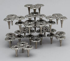 13 design candlesticks in white metal, can be assembled into modules. picture