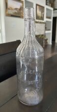 Antique Purple J. Rieger & Co Glass Whiskey Bottle Kansas City MO Embossed 11.5” picture