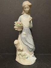 NADAL HANDCRAFTED PORCELAIN WOMAN FIGURINE CARRYING A BASKET OF FLOWERS  picture