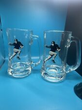 Set of 2 Libbey glass Stein Beer Mug / Glass with Football Player 6 1/4